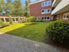 Stilvolle 1-Zimmer-Wohnung mit großer Terrasse in begehrter Wohnanlage – Bremen St. Magnus - Innenhof Bild 1
