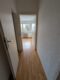 SOFORT FREI: Gepflegte 3 Zi. mit Duschbad und gr. Balkon - Flur Bild 1